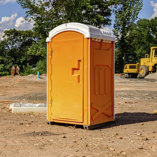 how often are the porta potties cleaned and serviced during a rental period in Harbert Michigan